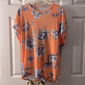 Sheer blouse - orange with blue flowers the back is open with a twist detail